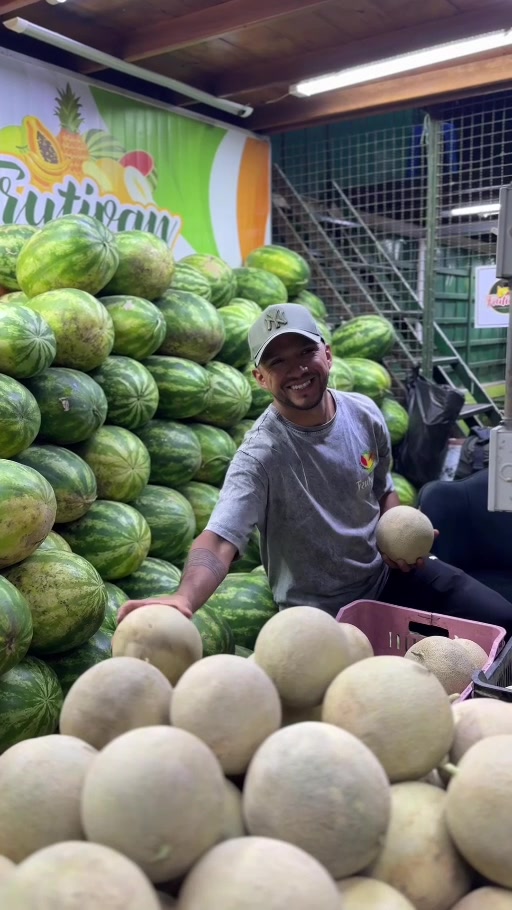 Comerciante entre melones y patillas